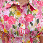 Floral cotton midi dress with pink and yellow flowers, drop shoulder sleeves, smocking, and pockets