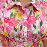 Floral cotton midi dress with pink and yellow flowers, drop shoulder sleeves, smocking, and pockets