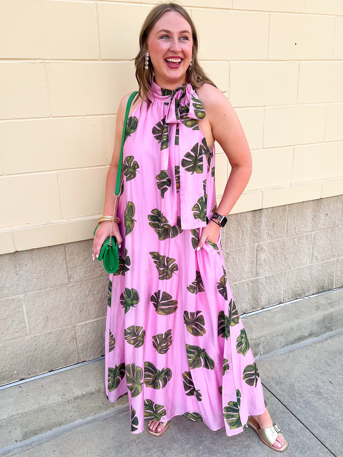 Pink tropical palm print maxi dress with halter neckline