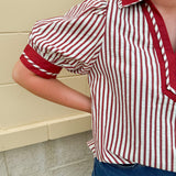 Rust and cream striped pullover top with puff sleeves, contrast rust cuffs and split collar—lightweight and perfect for early fall