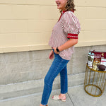 Rust and cream striped pullover top with puff sleeves, contrast rust cuffs and split collar—lightweight and perfect for early fall
