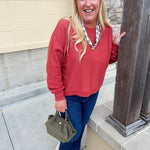 Rust viscose sweater with round neck and double front seam detail