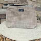[Scout] Go Getter Pouch in Sand Woven with textured woven material and side finger loop