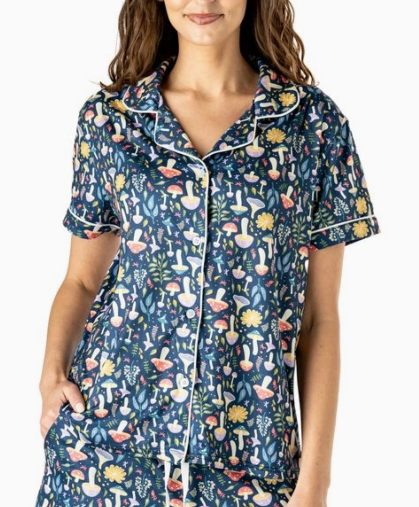 Navy pajama top with colorful mushroom print, button-down front, collar, and piping detail.