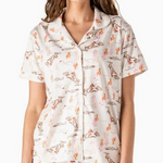 Cream pajama top with colorful cactus and cowgirl print, button-down front, collar, and piping detail.