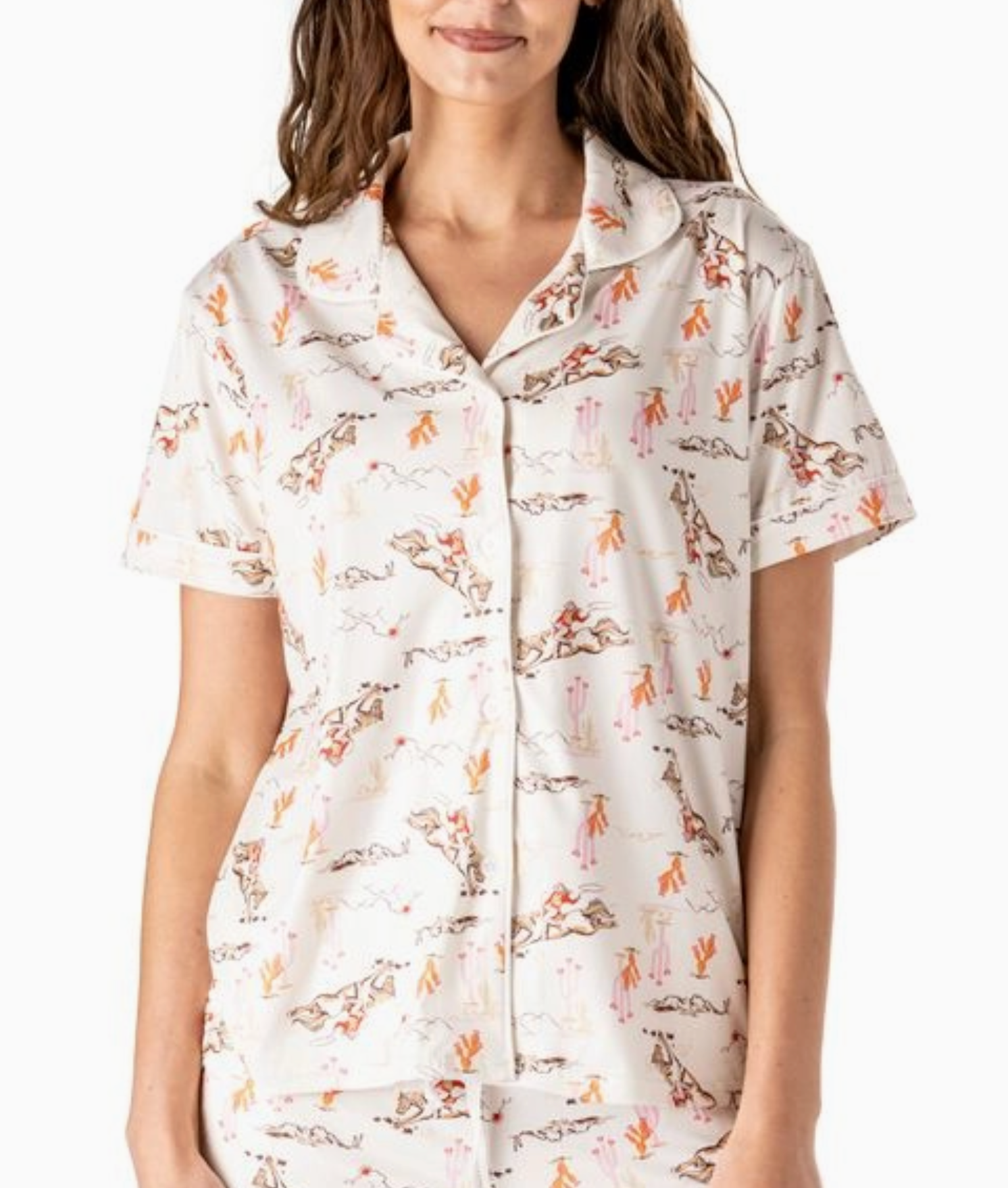 Cream pajama top with colorful cactus and cowgirl print, button-down front, collar, and piping detail.