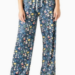 Navy pajama pants with whimsical mushroom print, wide-leg fit, and elastic waistband with drawstring tie.