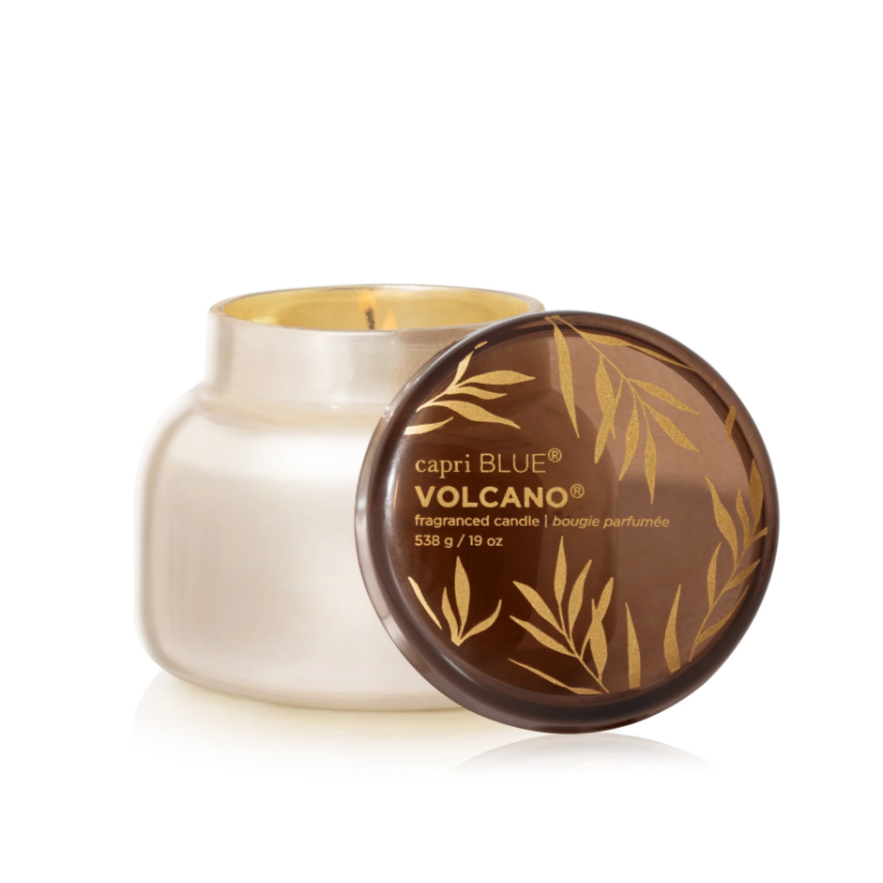 Capri Blue Volcano Autumn Glow candle in pearlescent jar with mocha brown lid, seasonal fall design.