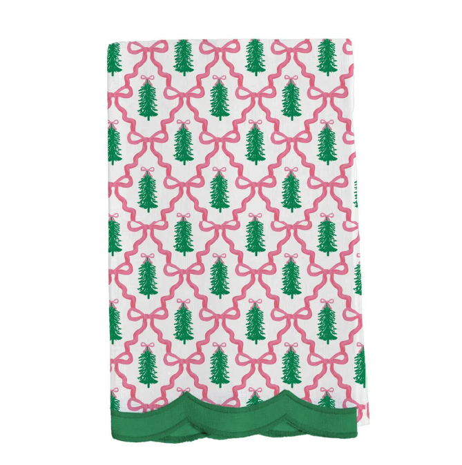 White Christmas tea towel with green trees, pink bows, argyle bow pattern, and green scalloped trim.