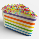 Cake slice squishy toy with rainbow sprinkles