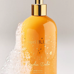 Orange pump hand wash with gold detailing, fall-inspired design