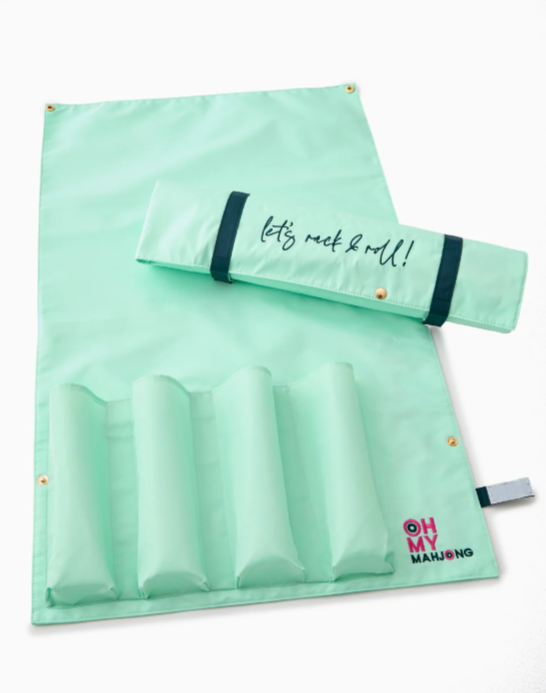 Mint embroidered storage bag with teal stitching and Velcro closure, designed to hold and organize racks and pushers.