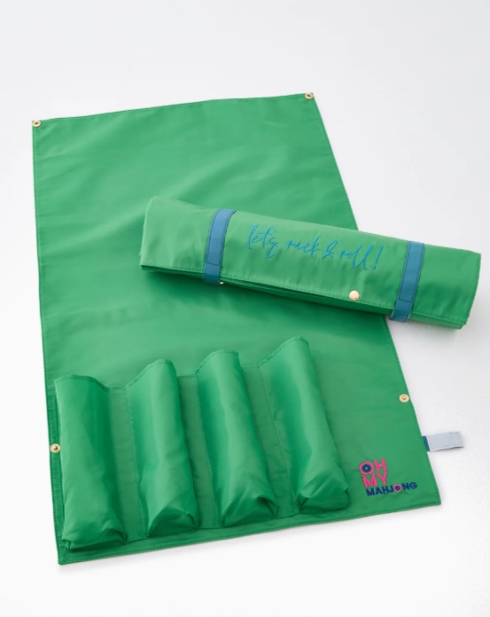 Kelly green embroidered storage bag with blue stitching and Velcro closure, designed for organizing racks and pushers.