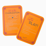 Orange Mahjong tile shufflers with printed rules and tips