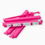 Set of four hot pink acrylic Mahjong racks with pushers