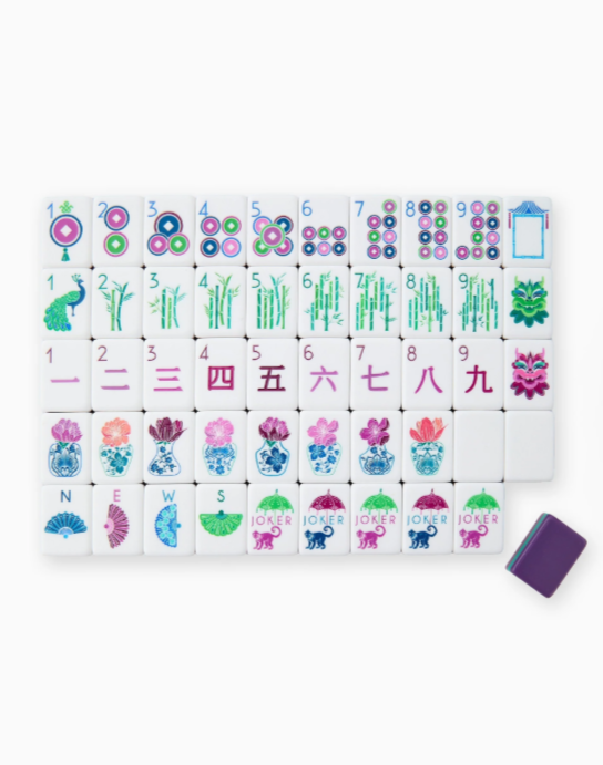 Gemma Mahjong Tiles in jewel tones of purple, green, and berry with dice/coin bag and instructional cards