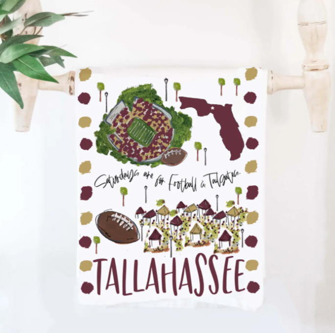 Garnet and gold tea towel with hand-drawn Doak Campbell Stadium and “Tallahassee, FL” design.