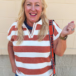 Orange striped collared sweater top