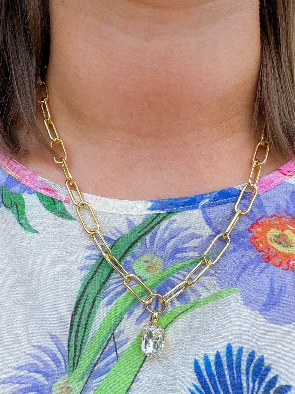 Elegant pendant necklace with a delicate design and subtle sparkle, handcrafted for timeless style.