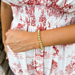 Elegant gold stretch bracelet with a timeless design, crafted for everyday wear and effortless layering.