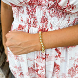 Elegant gold stretch bracelet with a timeless design, crafted for everyday wear and effortless layering.