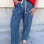 Lightweight barrel-leg pants with an allover star print and a relaxed elastic waistband.
