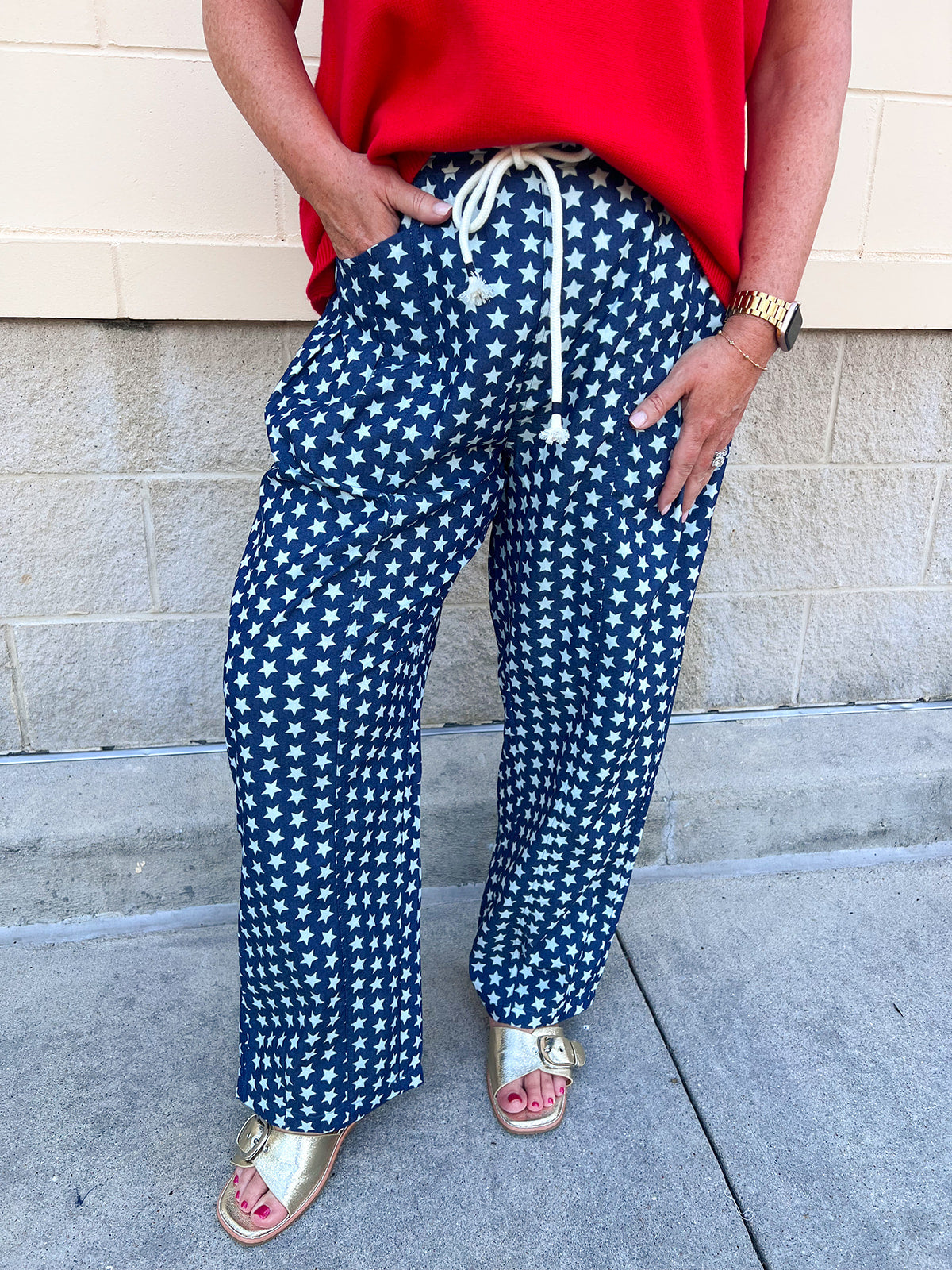 Lightweight barrel-leg pants with an allover star print and a relaxed elastic waistband.