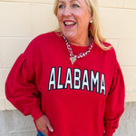Crimson fleece crewneck sweatshirt featuring oversized Alabama collegiate graphics with vintage chenille detailing and a relaxed fit.