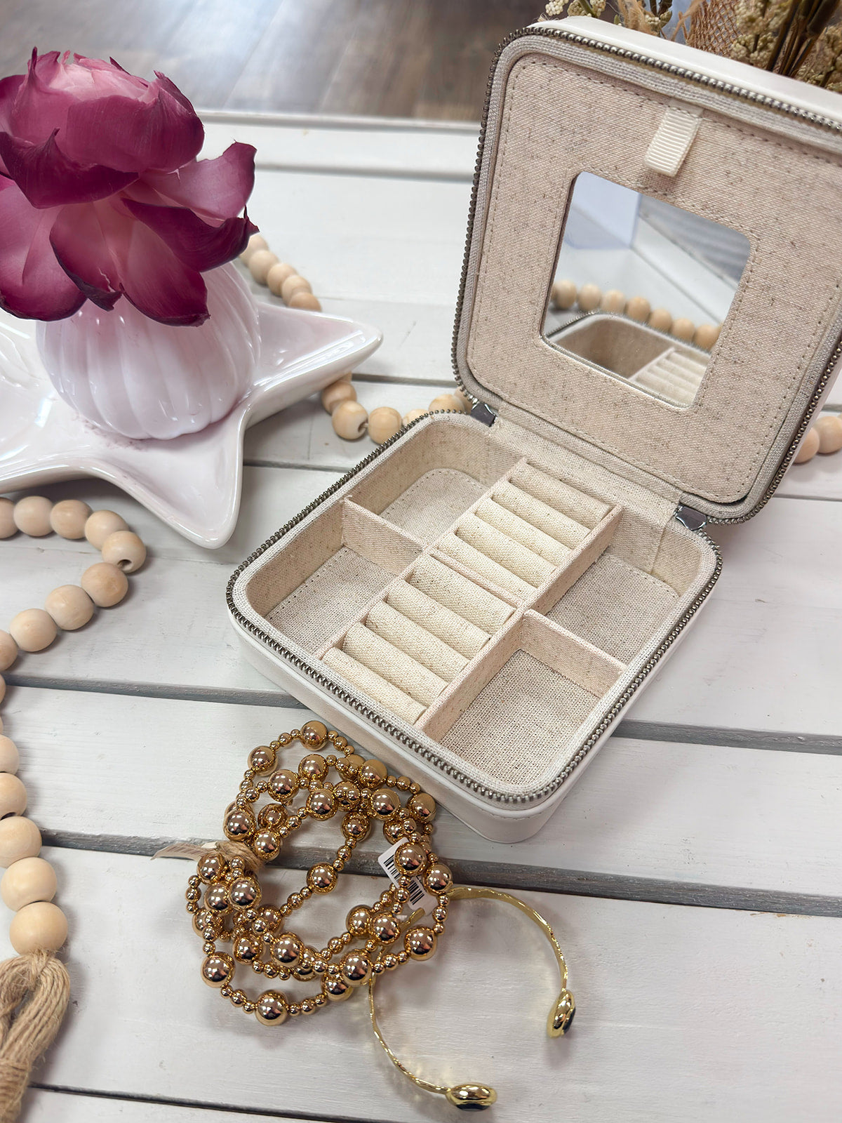 Leather jewelry box designed to showcase a 4 by 4 inch needlepoint 