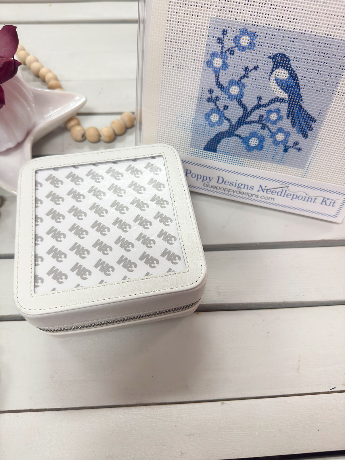 Leather jewelry box designed to showcase a 4 by 4 inch needlepoint 