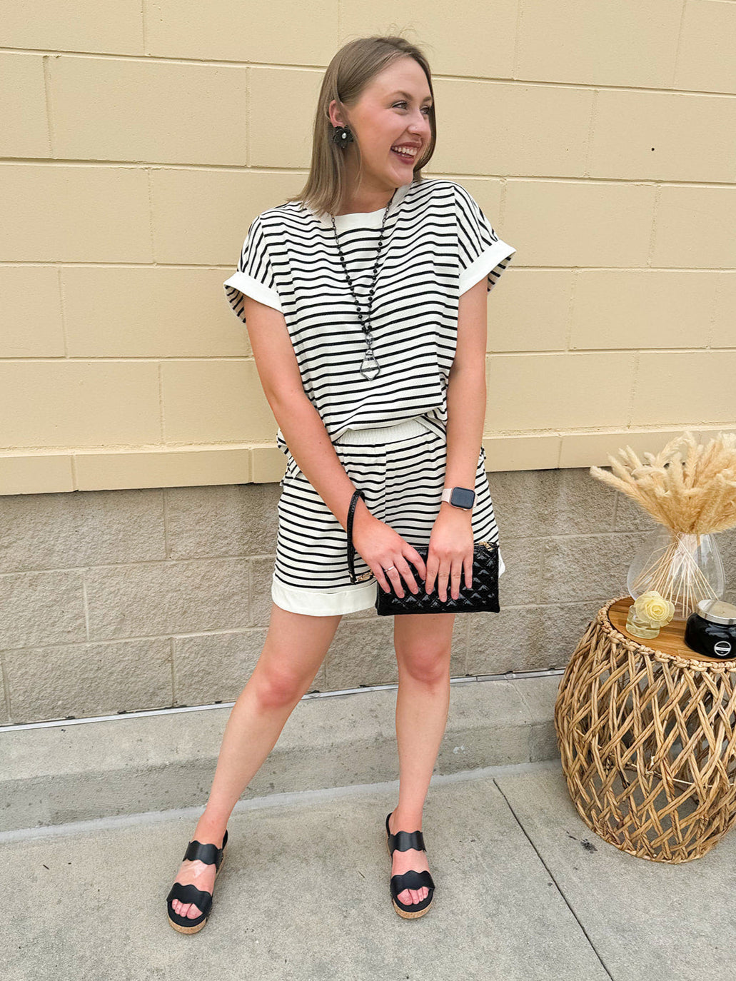 Sweet Melody Striped Knit Set with round neck top, cuffed sleeves, and matching cuffed shorts featuring an elastic waistband and side pockets.