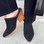 Black faux suede pointed toe mule heels with a block heel by Corkys