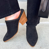 Black faux suede pointed toe mule heels with a block heel by Corkys