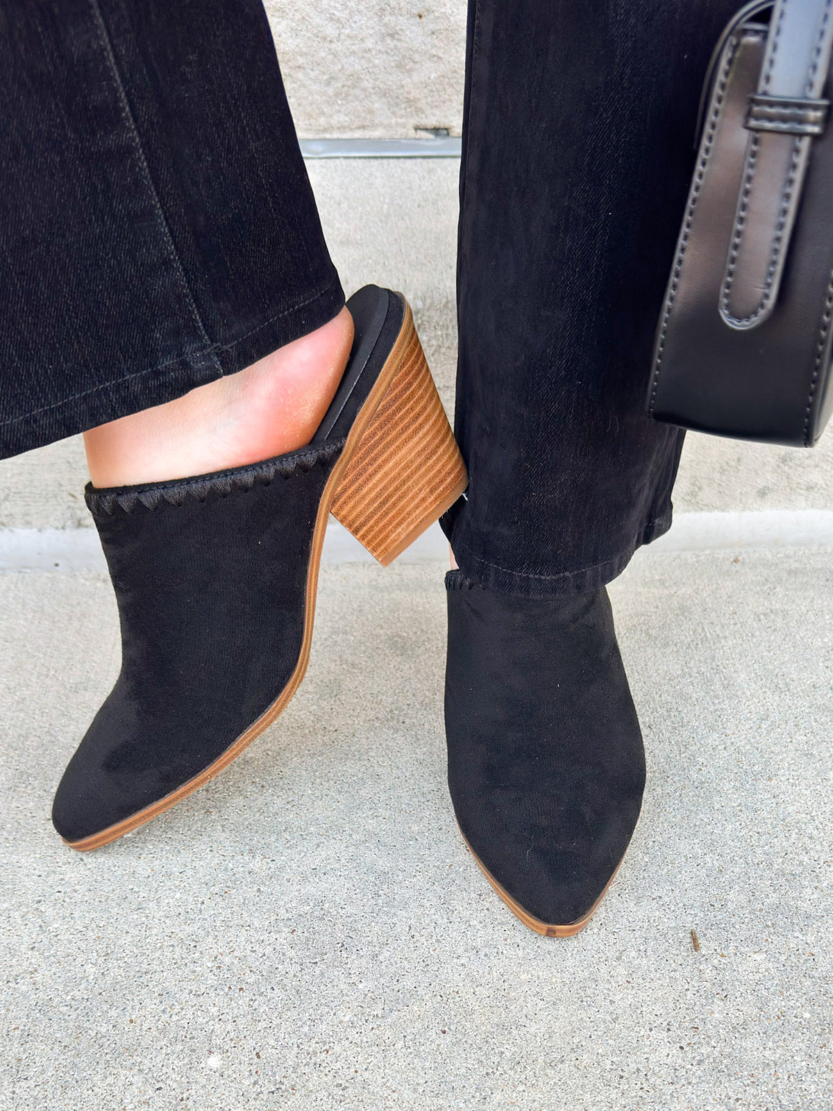 Black faux suede pointed toe mule heels with a block heel by Corkys