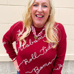 Red merino wool sweater with chain stitch embroidered Crimson Tide-inspired script and hand-drawn collegiate artwork.