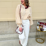 Tan and off-white striped long sleeve button-down shirt with collared neckline and cuffed sleeves—lightweight and perfect for layering