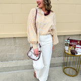 Tan and off-white striped long sleeve button-down shirt with collared neckline and cuffed sleeves—lightweight and perfect for layering