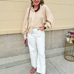 Tan and off-white striped long sleeve button-down shirt with collared neckline and cuffed sleeves—lightweight and perfect for layering