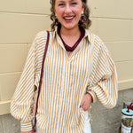 Tan and off-white striped long sleeve button-down shirt with collared neckline and cuffed sleeves—lightweight and perfect for layering