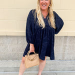 Navy embroidered mini dress with v-neck, ruffle collar, and ¾-length cuffed sleeves