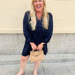 Navy embroidered mini dress with v-neck, ruffle collar, and ¾-length cuffed sleeves