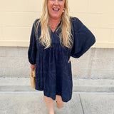 Navy embroidered mini dress with v-neck, ruffle collar, and ¾-length cuffed sleeves