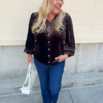  Brown velvet blouse with a ruffle neckline, silver sparkle buttons, and long sleeves