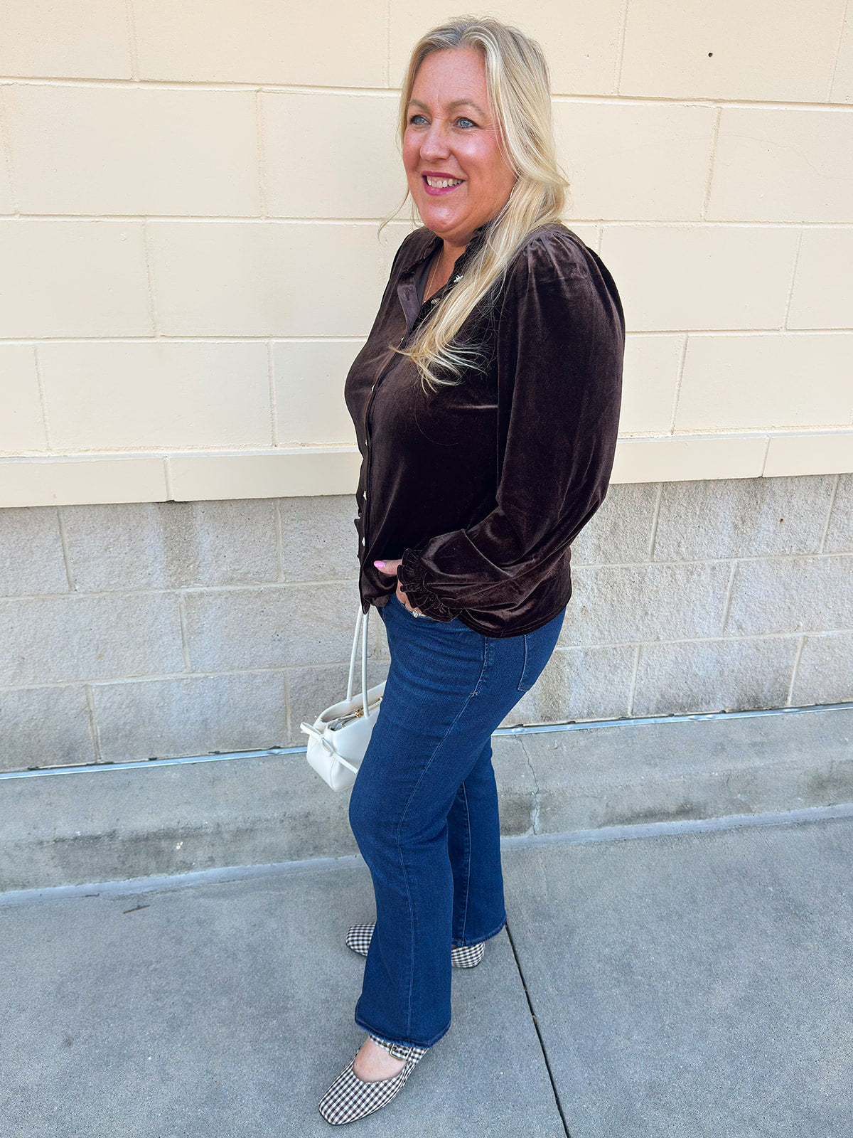  Brown velvet blouse with a ruffle neckline, silver sparkle buttons, and long sleeves