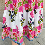 White cotton floral tiered maxi dress with flutter sleeves and ruffle collar