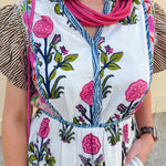 White cotton floral tiered maxi dress with flutter sleeves and ruffle collar