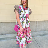 White cotton floral tiered maxi dress with flutter sleeves and ruffle collar