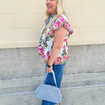White cotton flutter sleeve top with floral print and ruffle neckline