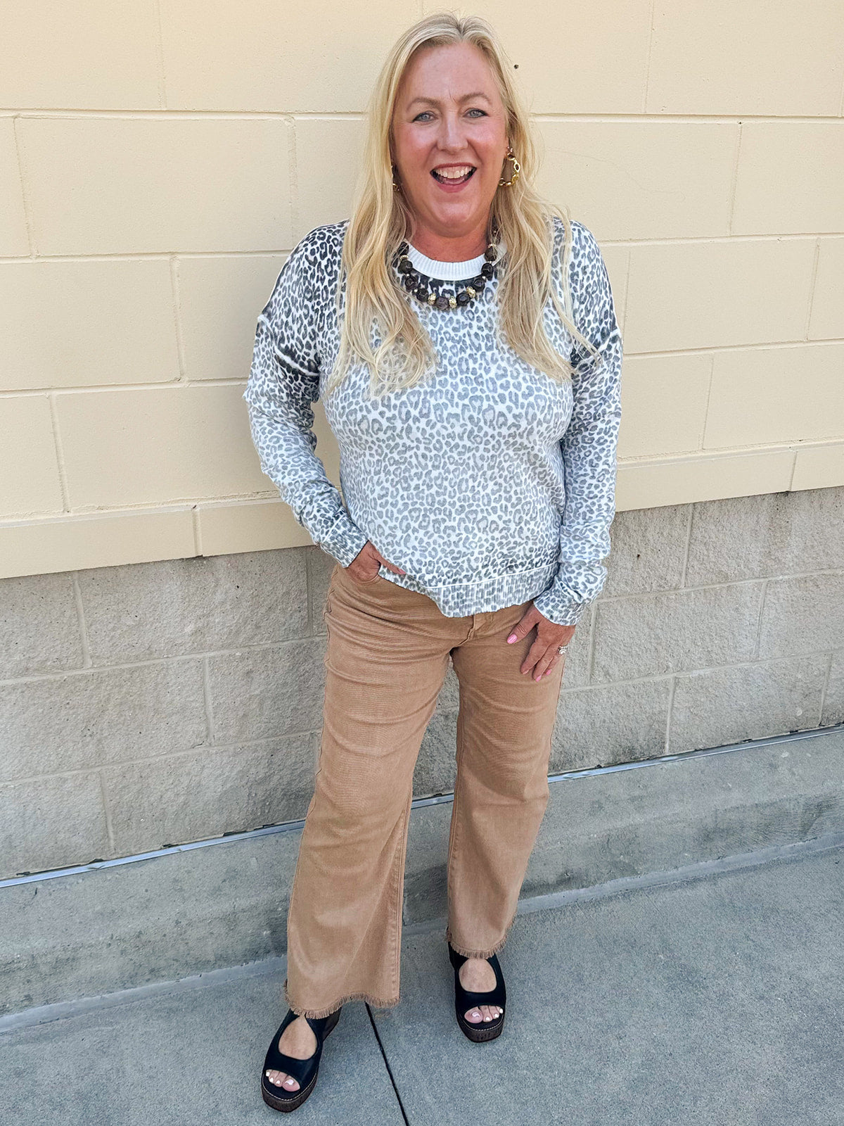 Wildly Pretty cream sweatshirt with allover cheetah print and cream neckline