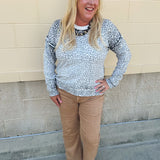 Wildly Pretty cream sweatshirt with allover cheetah print and cream neckline